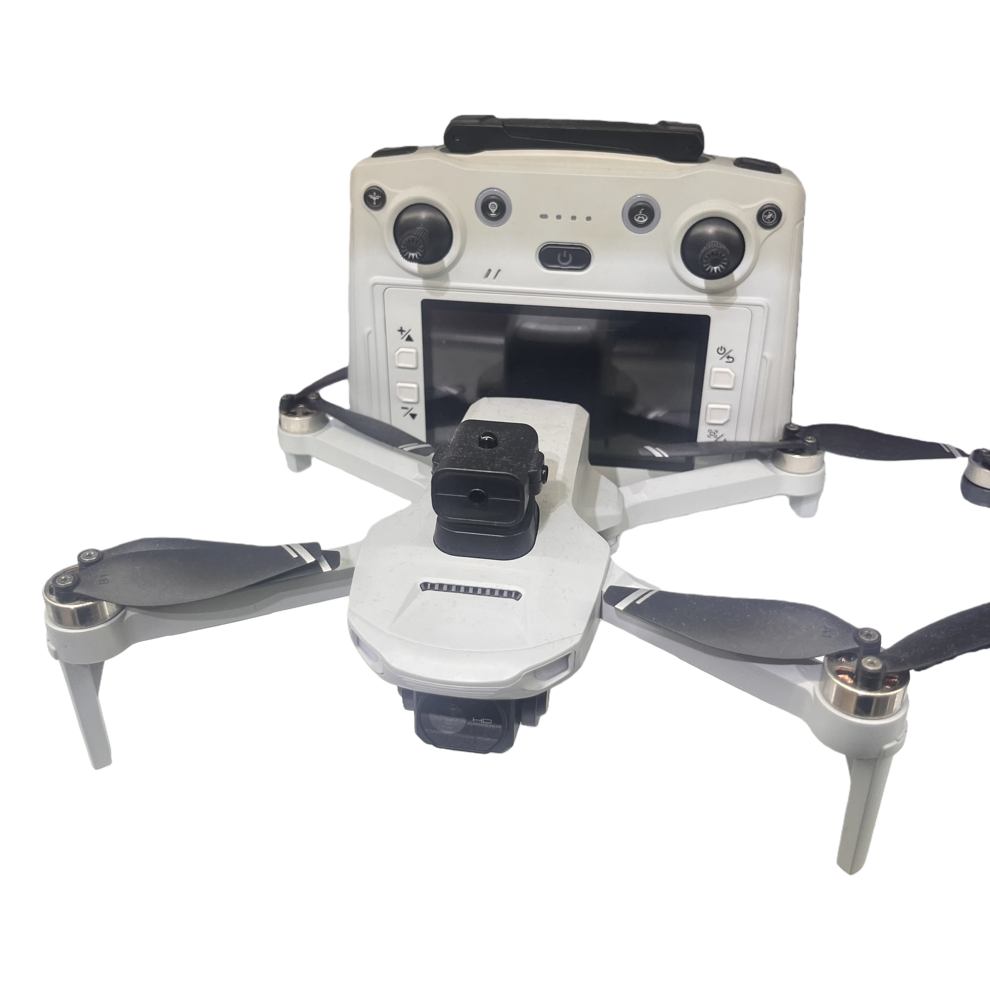 The white drone features a lightweight design and is a dual-purpose indoor and outdoor remote-controlled aerial photography device Item Picture