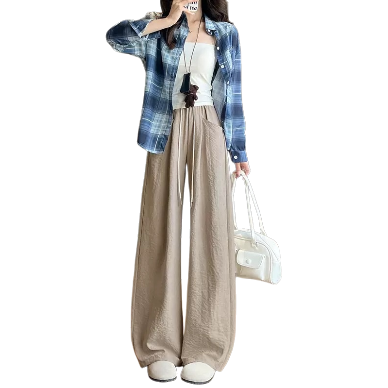 A fashionable look for women with a blue and white checkered shirt paired with beige wide-leg pants Item Picture