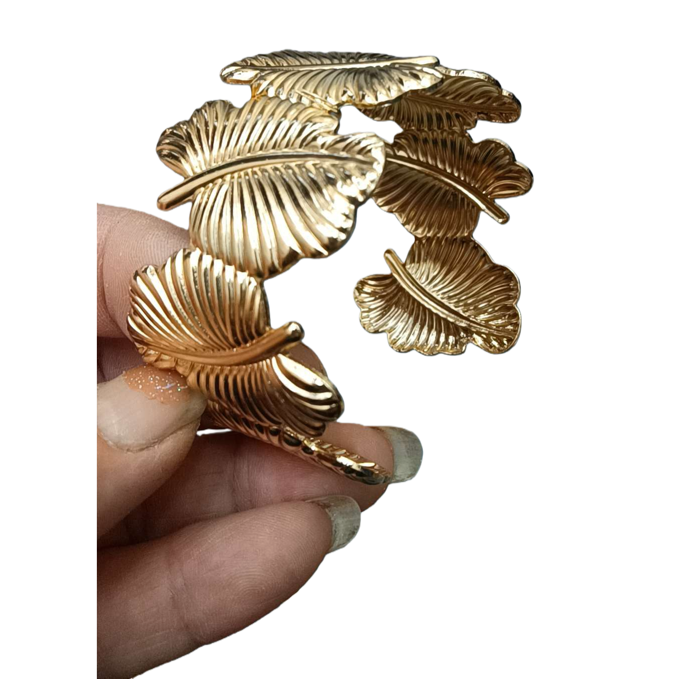 A golden feather-shaped bracelet is a fashionable and light luxury wrist accessory for ladies Item Picture