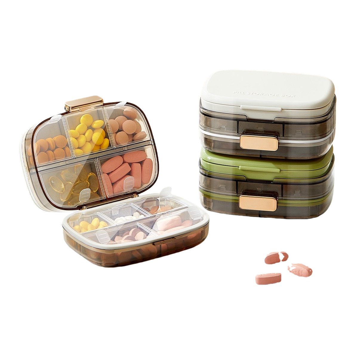 The ten-compartment medicine box is transparent with golden fasteners and comes with a white and green double lid, containing multi-colored tablets Item Picture