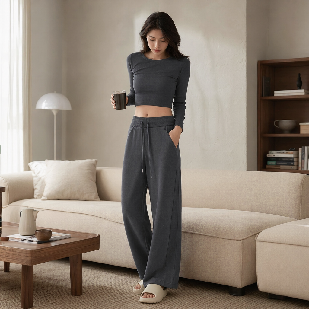 Grey loose sportswear pants are versatile for both men and women, with a good drape that makes them look slimmer details Picture