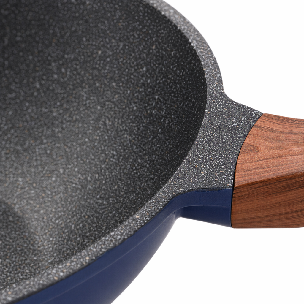 A black-spotted inner pot, blue body and wooden handle wok Application Scenario