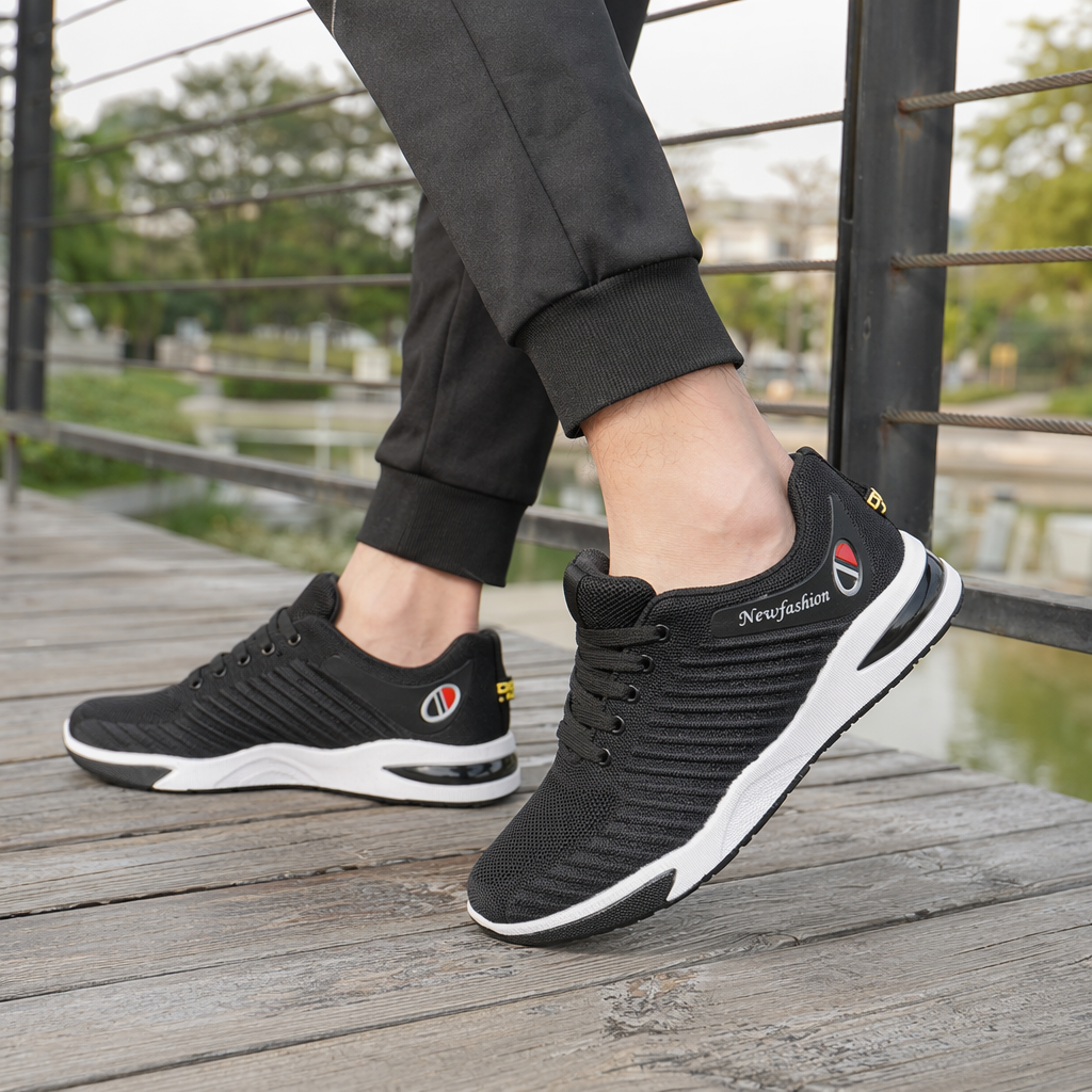 Three pairs of men's sports shoes in black, grey and red details Picture