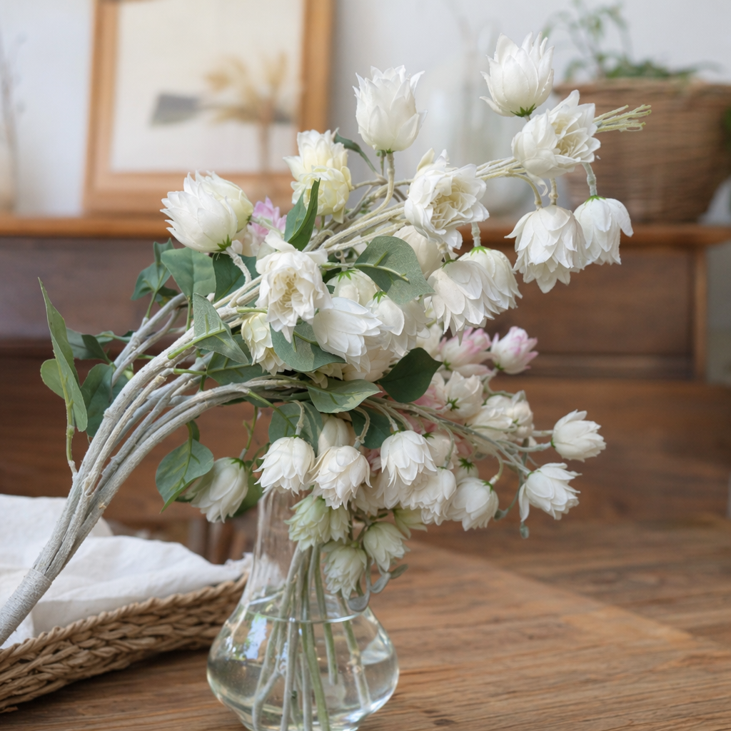 White artificial flower bouquets are decorative items for living rooms and bedrooms, as well as background floral arrangements for wedding photos details Picture
