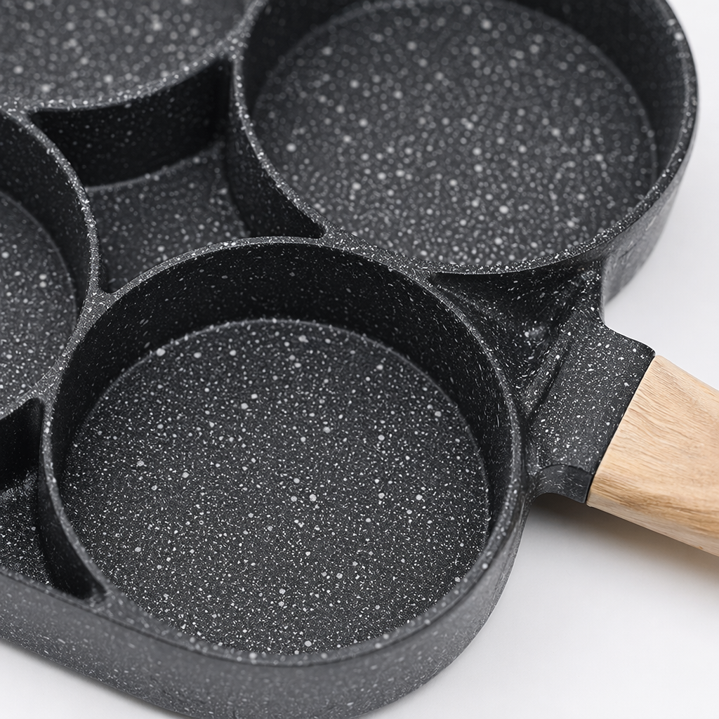 Black four-hole frying pan with wooden handle, household non-stick egg frying pan, kitchen cookware Application Scenario