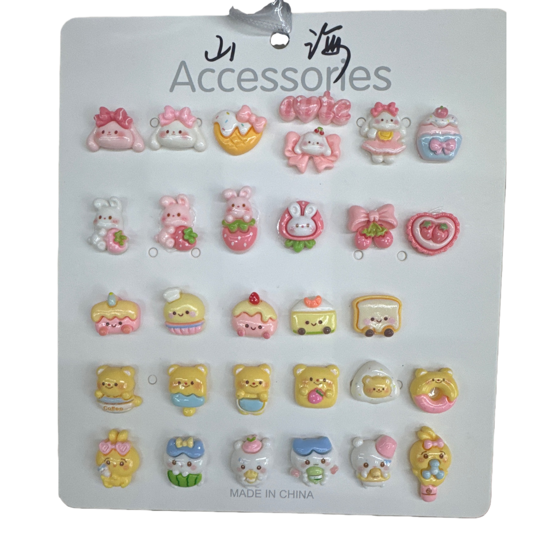 A white display board with cartoon decorative hanging pieces for wall decoration, storage and display stand Item Picture