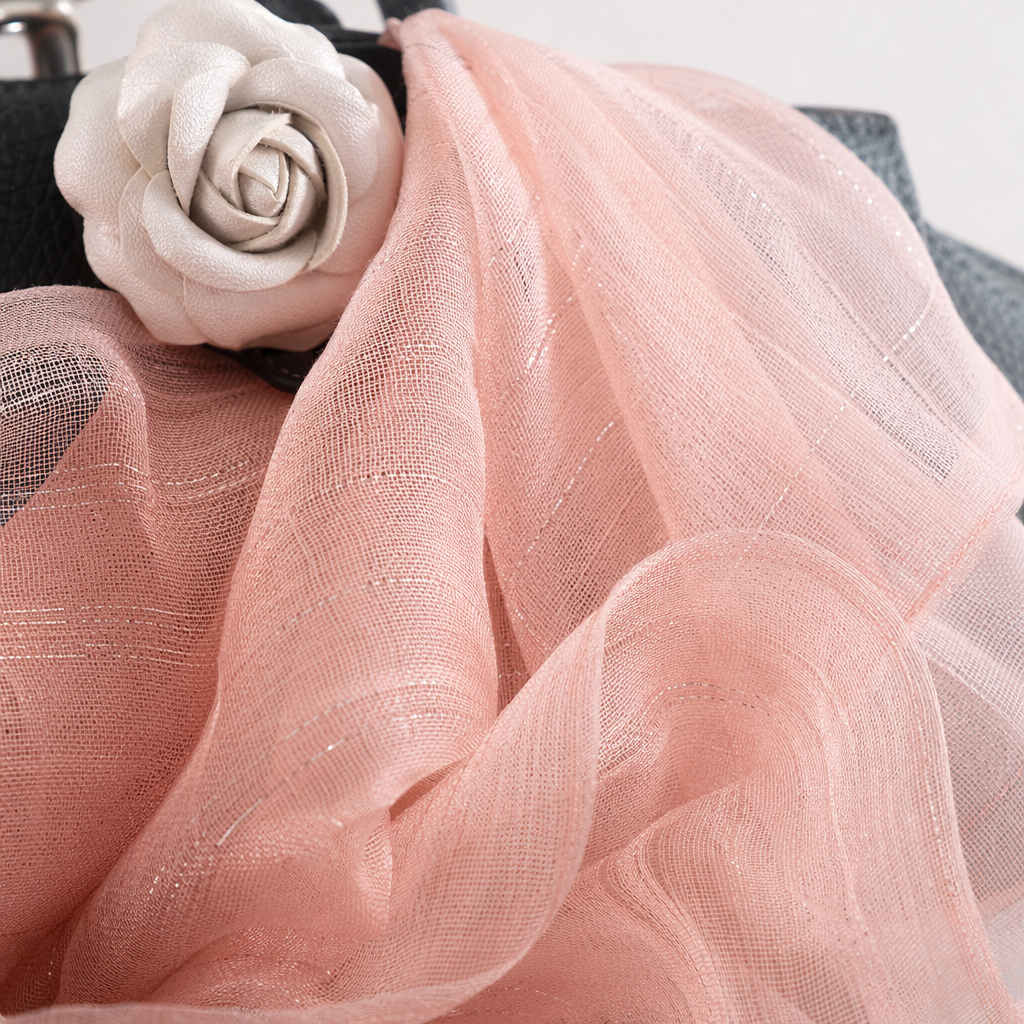 A pink mulberry silk square scarf is a small accessory for women to look fair and elegant during commuting Application Scenario