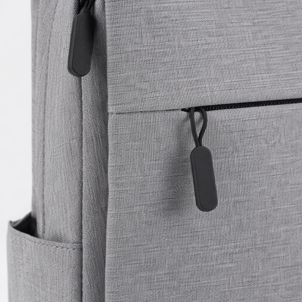 A simple and fashionable grey backpack with a large capacity for both men and women, suitable for commuting and travel Application Scenario