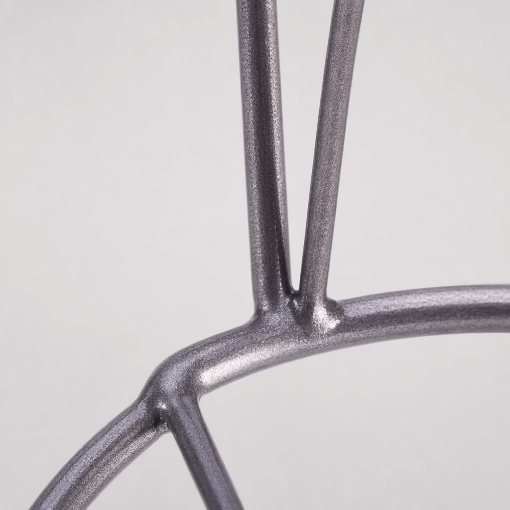 A grey metal desktop storage adjustable laptop stand Application Scenario