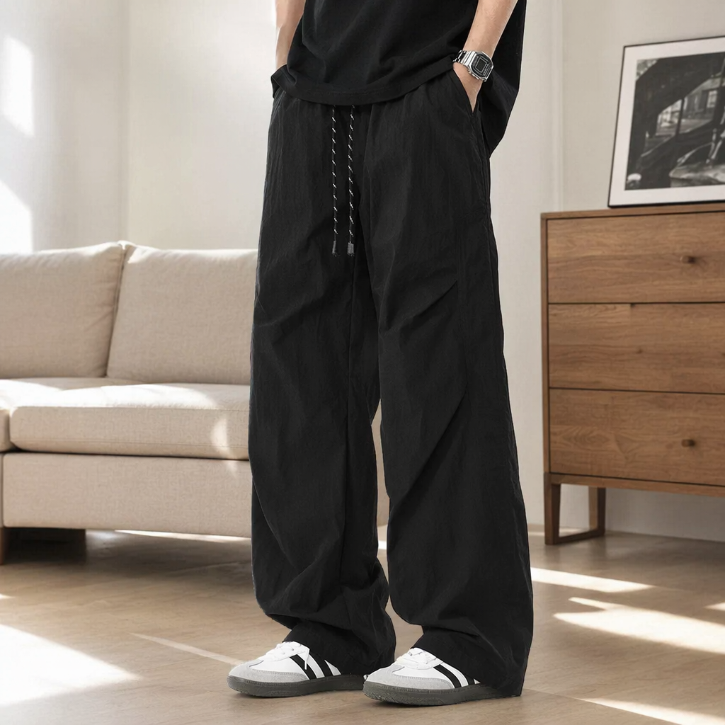 Black loose long pants for women, casual and slimming with a flowing straight leg details Picture