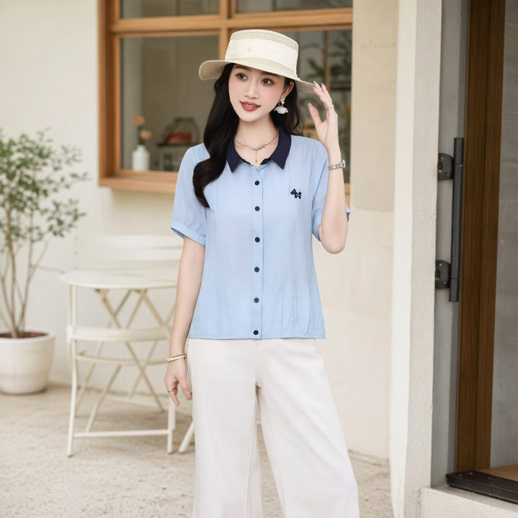 A light blue short-sleeved shirt with a dark blue collar for women, a fashionable and casual top details Picture