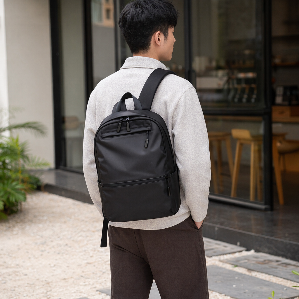 The black nylon water-resistant commuting backpack is lightweight and wear-resistant for daily school use details Picture