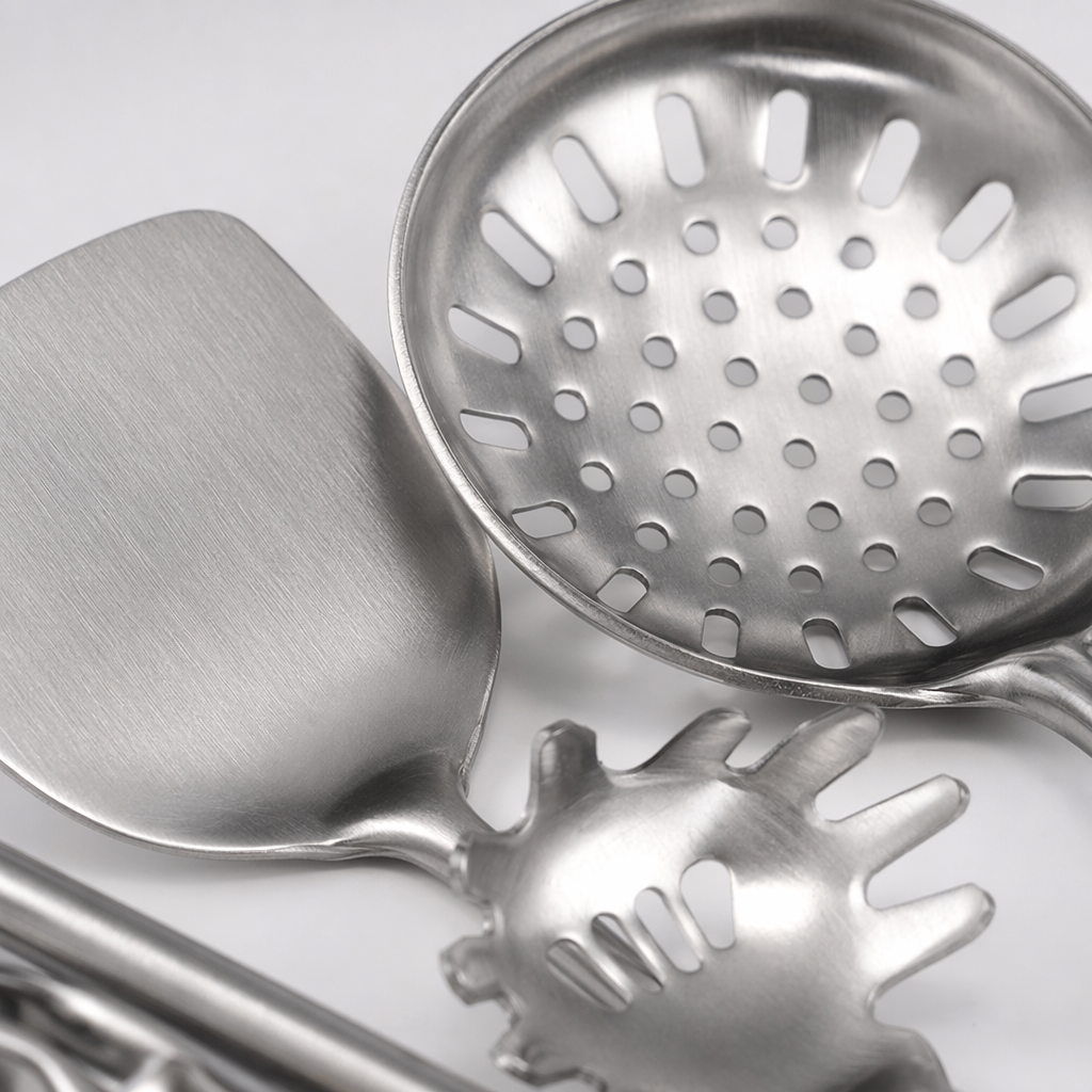 A 12-piece stainless steel kitchenware set, including woks, frying pans, soup POTS, spatulas and spoons, for household kitchen cooking tools Application Scenario