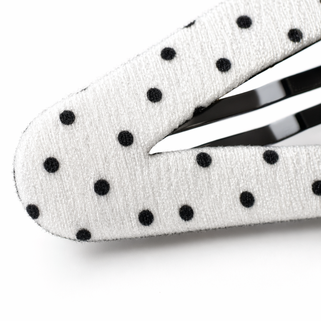 The black and white polka dot hair clip is a simple and retro headwear for women. The metal buckle is anti-slip and not easy to fall off Application Scenario
