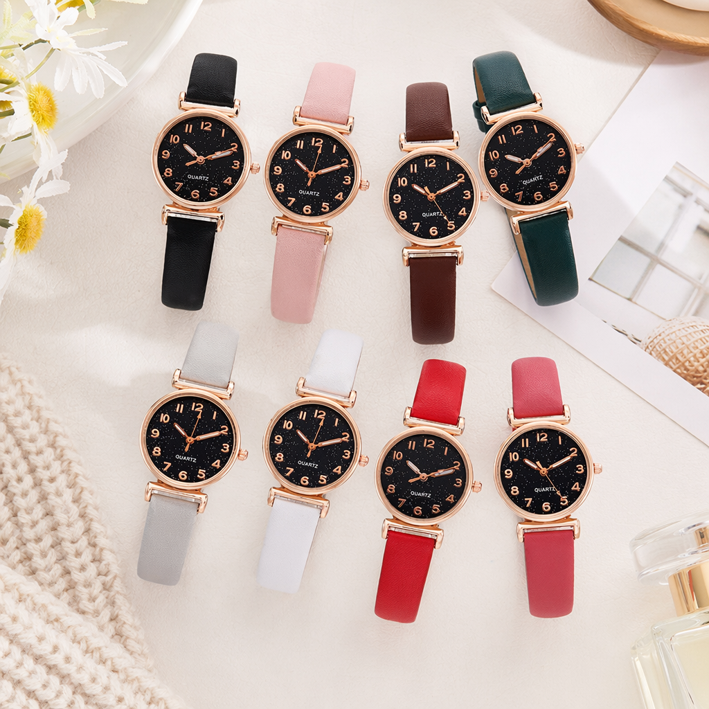 A group of watches with black dials and rose gold borders details Picture