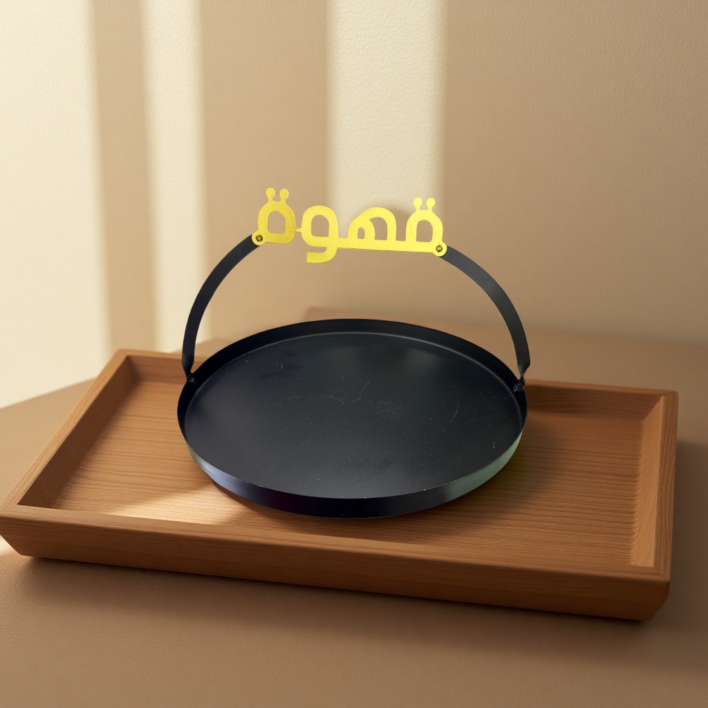 Black circular tray decorated with gold مُهْم details Picture