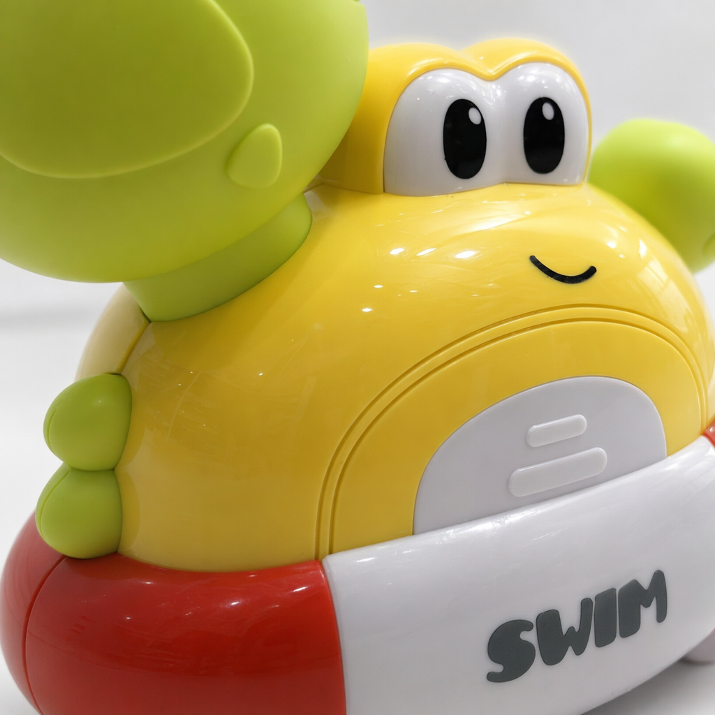 Yellow frog-shaped toy, green arm, red and white decorated SWIM word Application Scenario