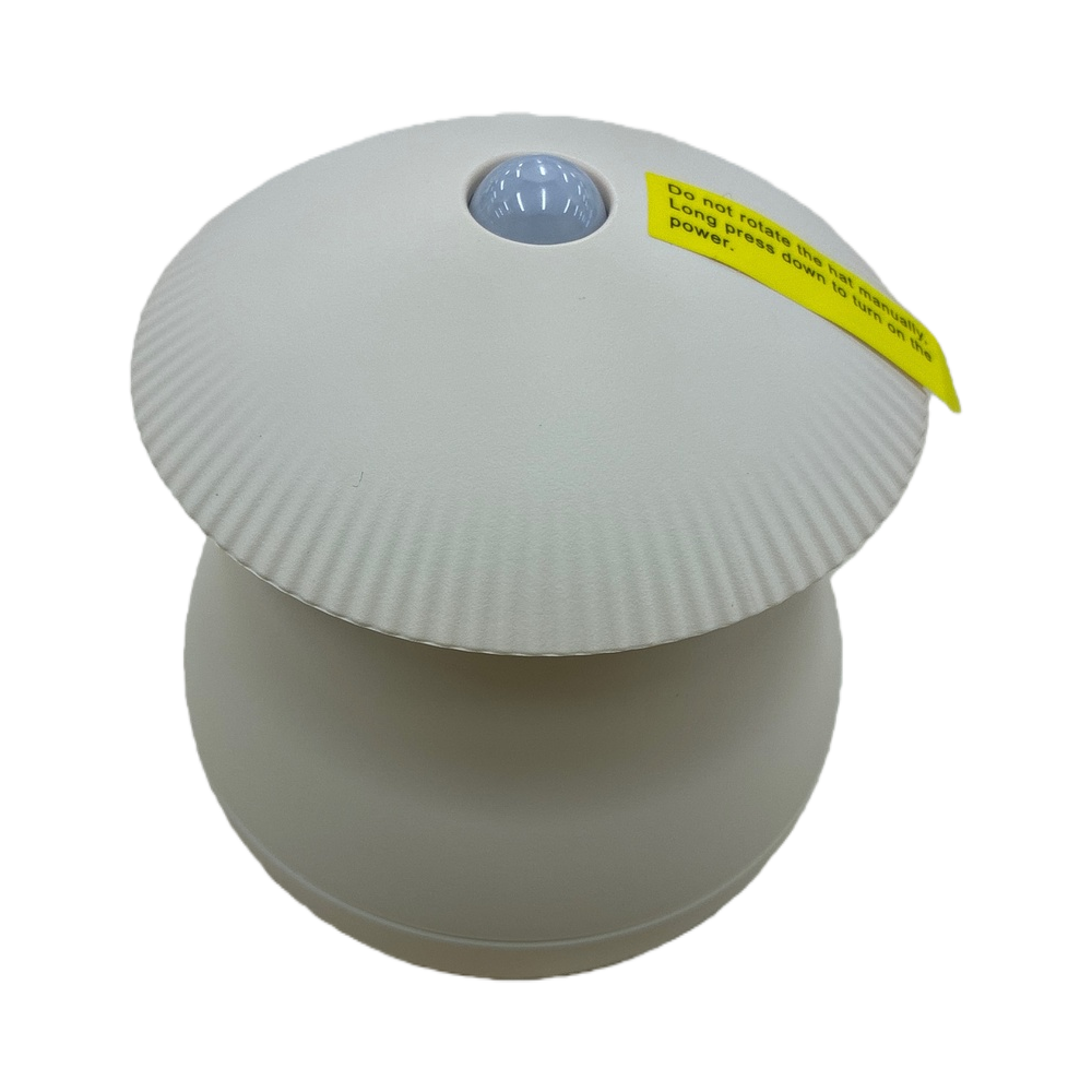A circular device with a beige textured cover Item Picture
