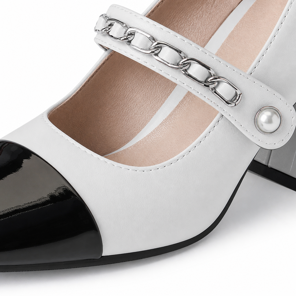 A women's suit featuring a white top, a white short skirt, nude stockings and black and white high heels Application Scenario