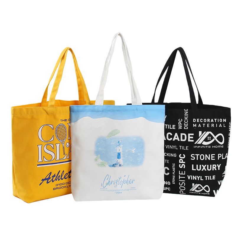 Three simple and solid color canvas bags in yellow, white and black for hand-held shopping Item Picture