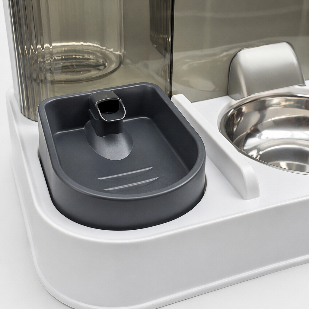 A white automatic pet feeder with a grey drinking tray and stainless steel food bowl Application Scenario