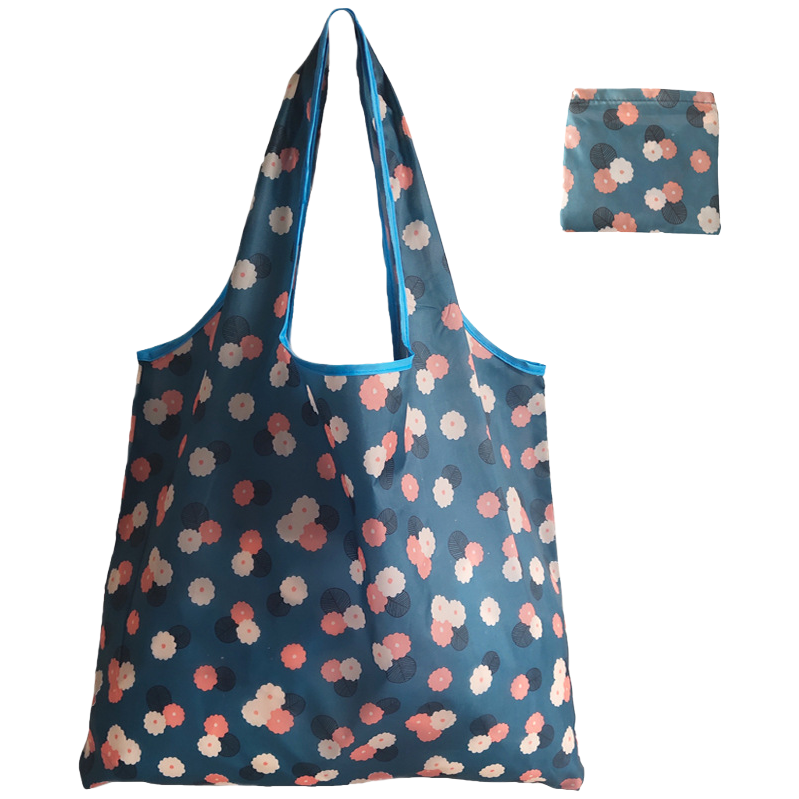 A large-capacity, lightweight and eco-friendly foldable shopping bag with blue background and floral patterns Item Picture