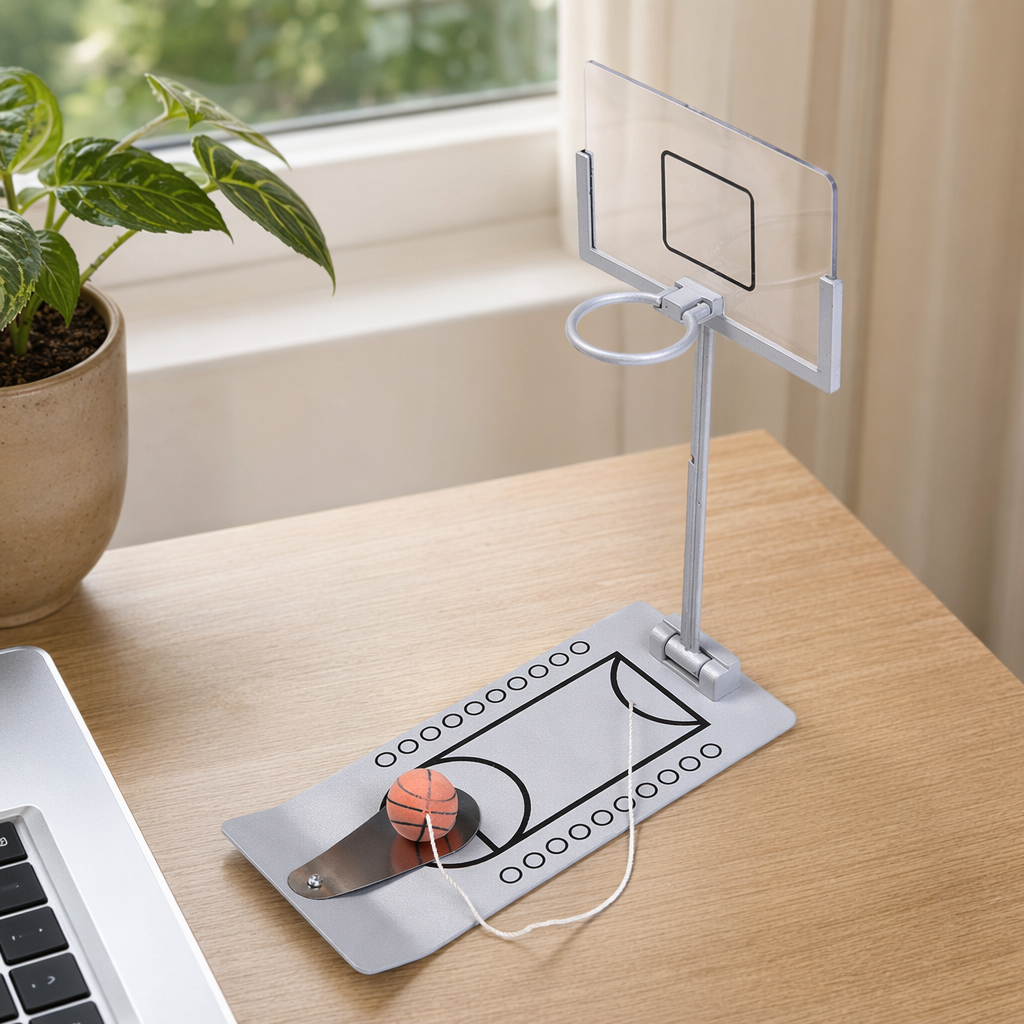Silver desktop mini basketball stand with orange small balls and transparent backboard for home, office and entertainment details Picture