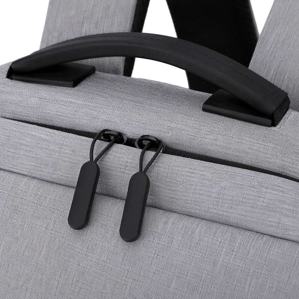 A simple and fashionable grey backpack with a large capacity for both men and women, suitable for commuting and travel Application Scenario