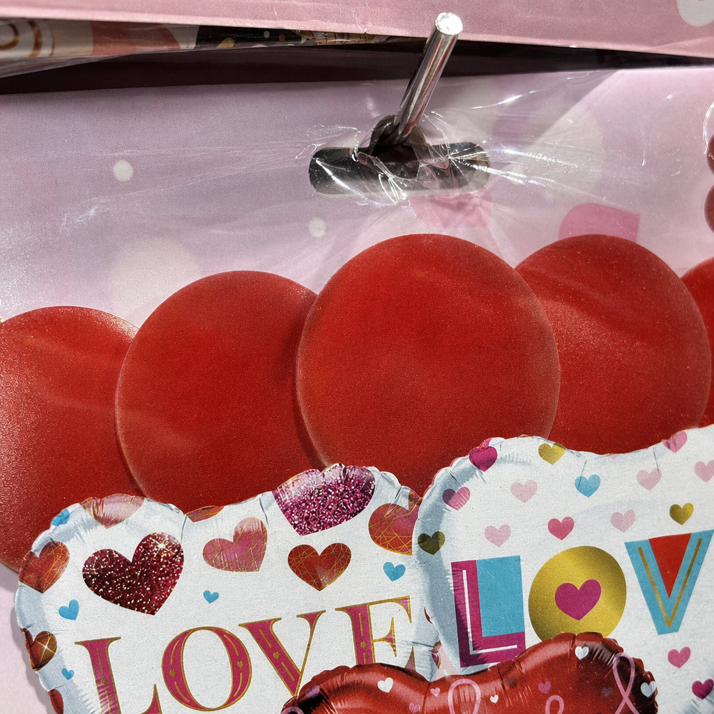 The pink packaging bag contains red heart-shaped LOVE decorative balloons Application Scenario
