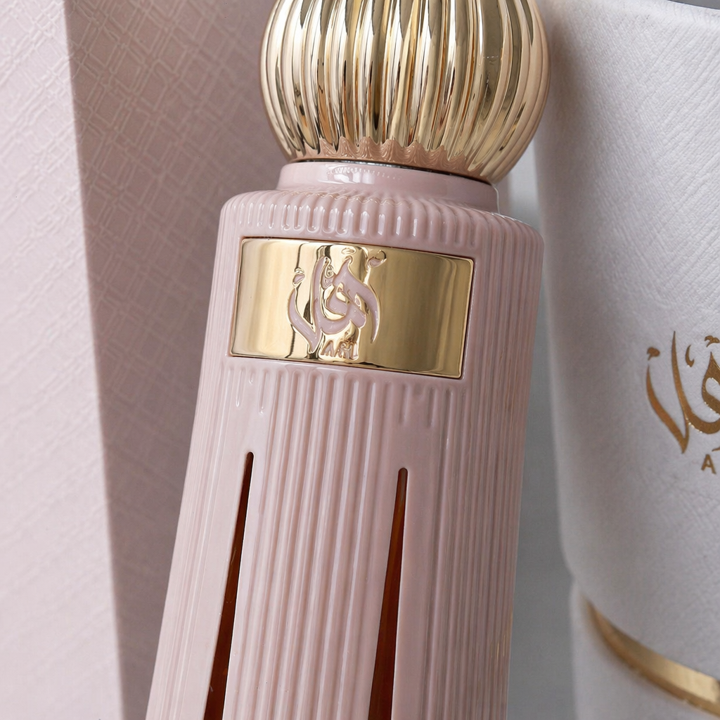 A perfume bottle with a white striped body and a beige textured cap Application Scenario