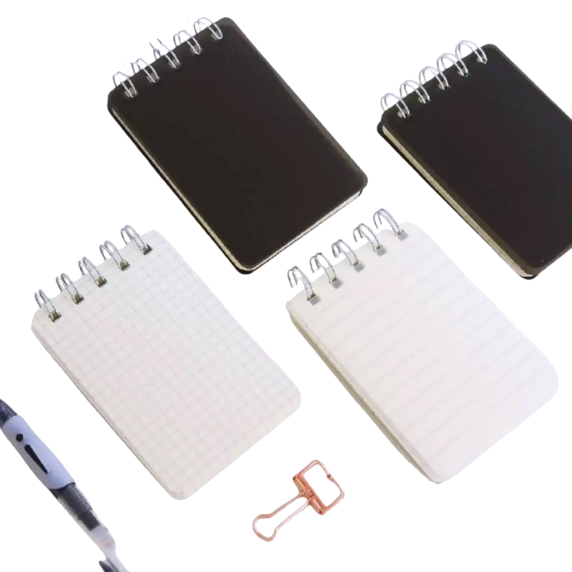 A white keyboard with black spiral grid lines, a notebook with a pen and a golden clip Item Picture