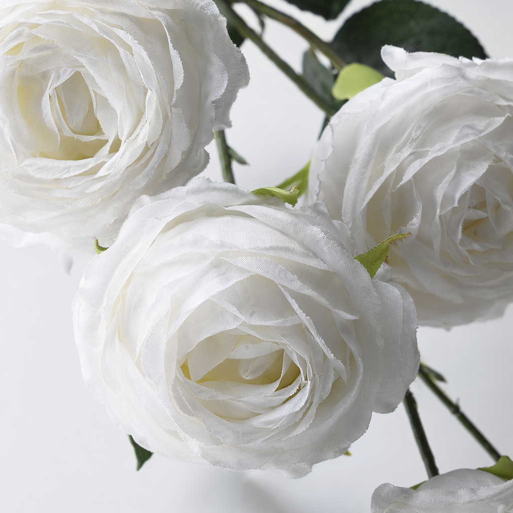 A white artificial rose bouquet simulating preserved flowers for wedding decoration and living room ornaments Application Scenario
