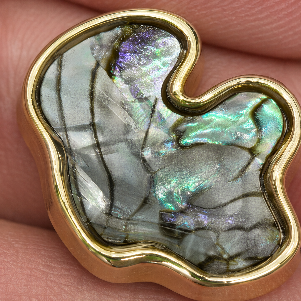 A delicate palm-sized ornament with a golden frame and shell inlaid pendant Application Scenario
