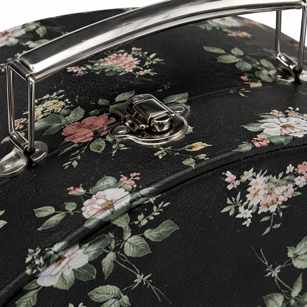A fashionable and lightweight travel storage case with a black floral pattern round suitcase Application Scenario