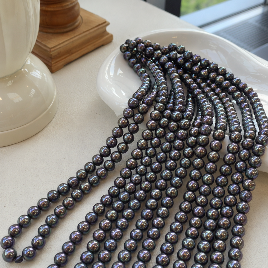 A deep purple natural pearl necklace with beads is an elegant accessory for women details Picture