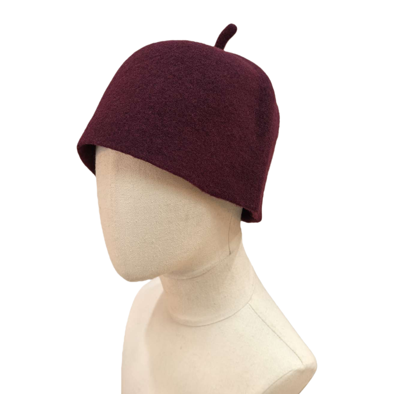 A wine-red woolen hat for display on a table, a warm women's hat for autumn and winter, a cross-border printed felt sauna hat with water absorption and heat insulation, and logo patterns can be added. This cross-border export hat is selling well Item Picture
