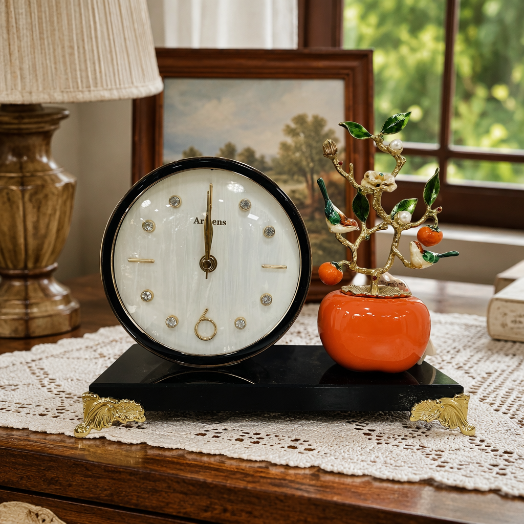 A black base with golden decoration, a table clock and a persimmon bird branch ornament set details Picture