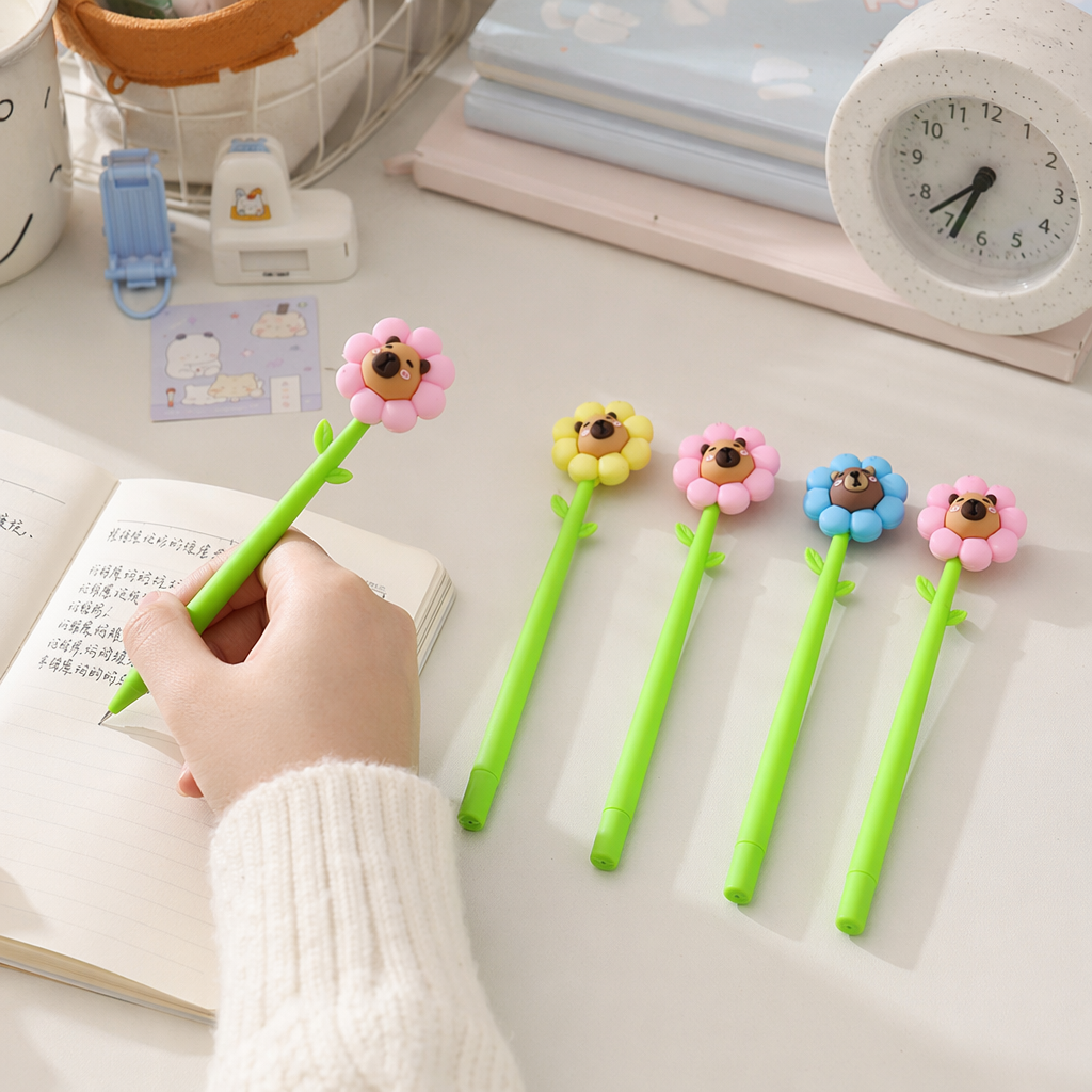 Colorful flower-shaped cartoon animal face pen with pink, yellow and blue patterns and green leaf-shaped pen barrel details Picture