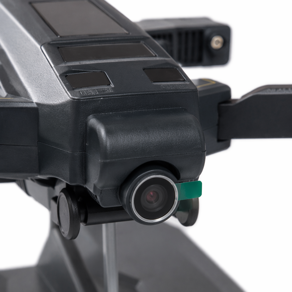 A black folding drone with a high-definition camera and a display stand Application Scenario