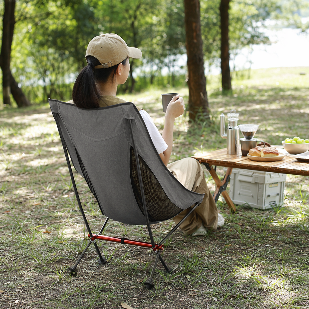 The grey folding chair is a portable, lightweight, and load-bearing small stool for outdoor camping and indoor use details Picture