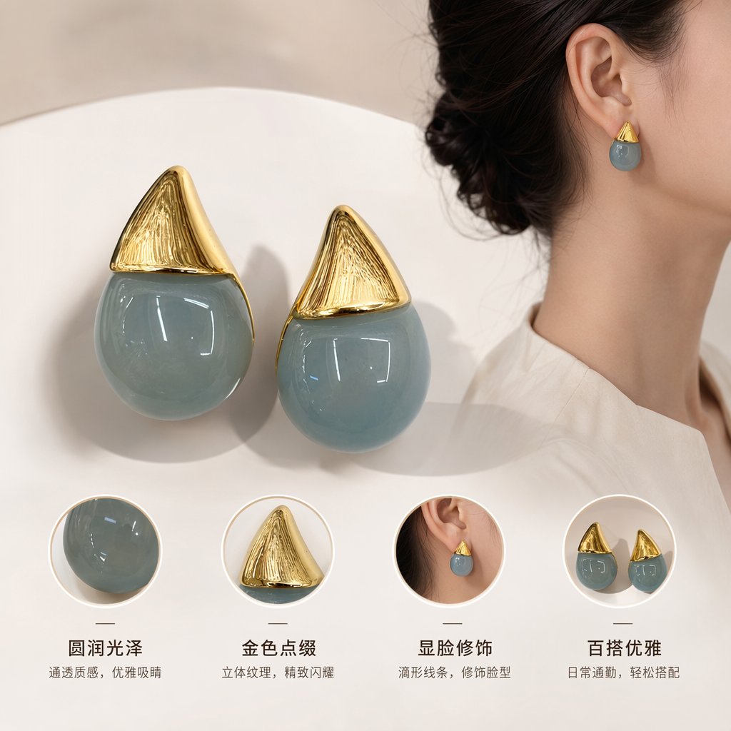 浅蓝透明水滴形耳钉配金色尖头装饰