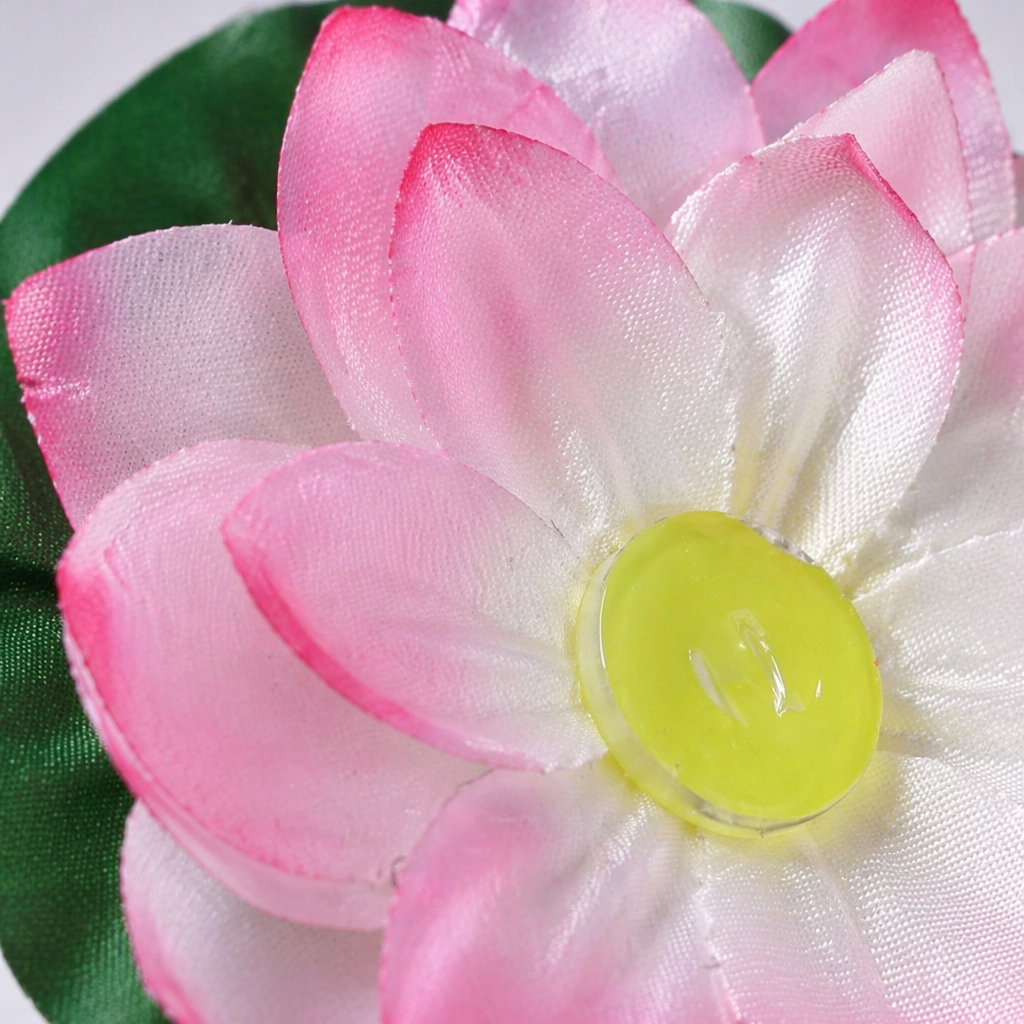 Pink lotus lamp with pinkish-white gradient petals, light green wick and lotus leaf base Application Scenario