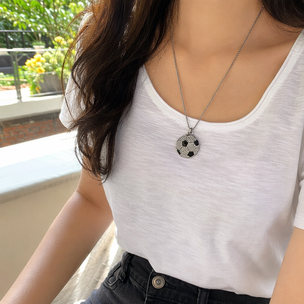 Silver football-shaped necklace in a fashionable and sporty style, suitable for both men and women details Picture