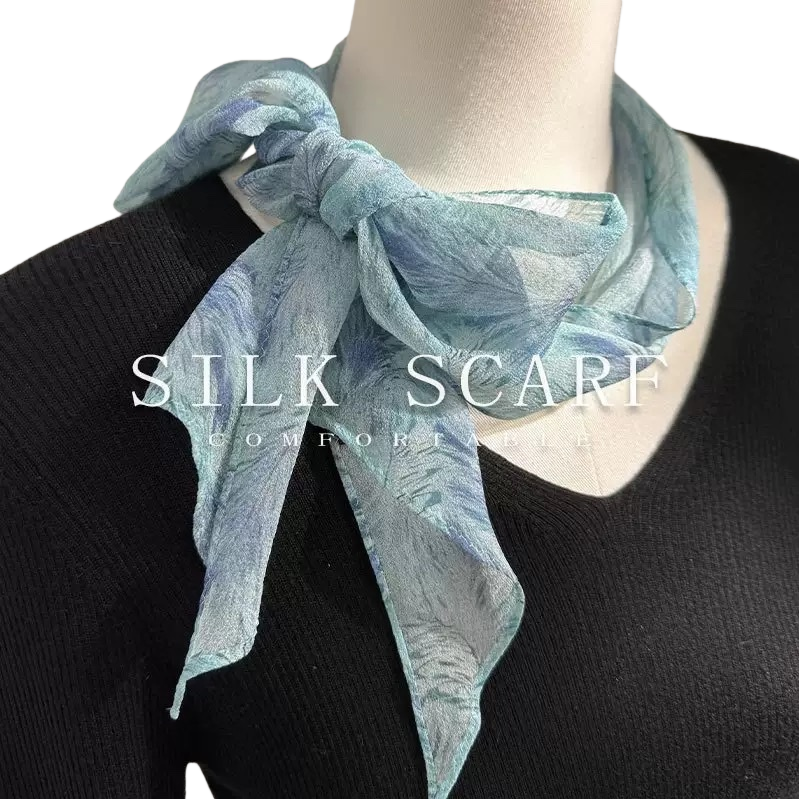 The blue-green printed silk scarf is a thin and fashionable choice for women in spring and summer Item Picture