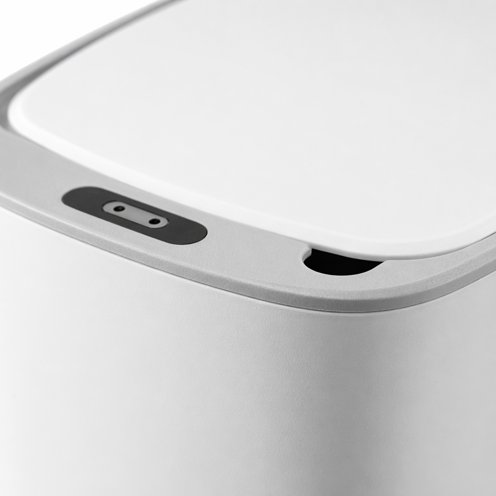 White smart sensor trash can for household use, with silent automatic lid opening and pedal operation Application Scenario
