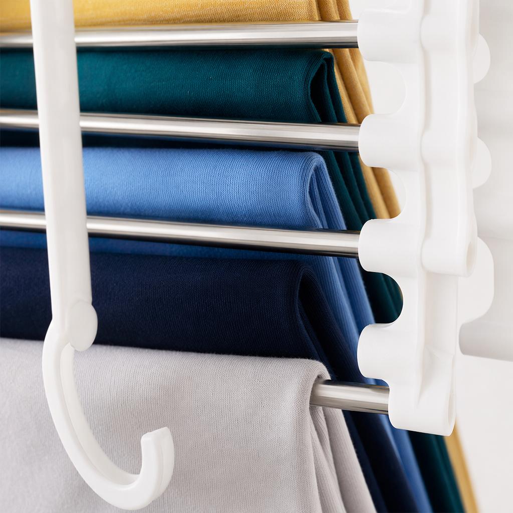 The white multi-layer trouser rack is filled with colorful trousers, making it a perfect home storage and organization tool for wardrobes without holes Application Scenario