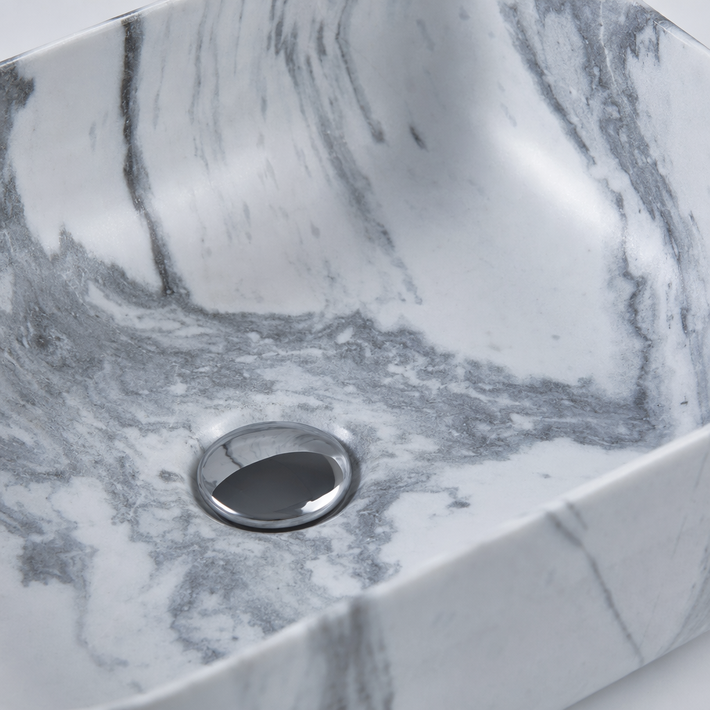 A simple and modern bathroom fixture with a grey and white marble-textured ceramic washbasin and under-sink Application Scenario