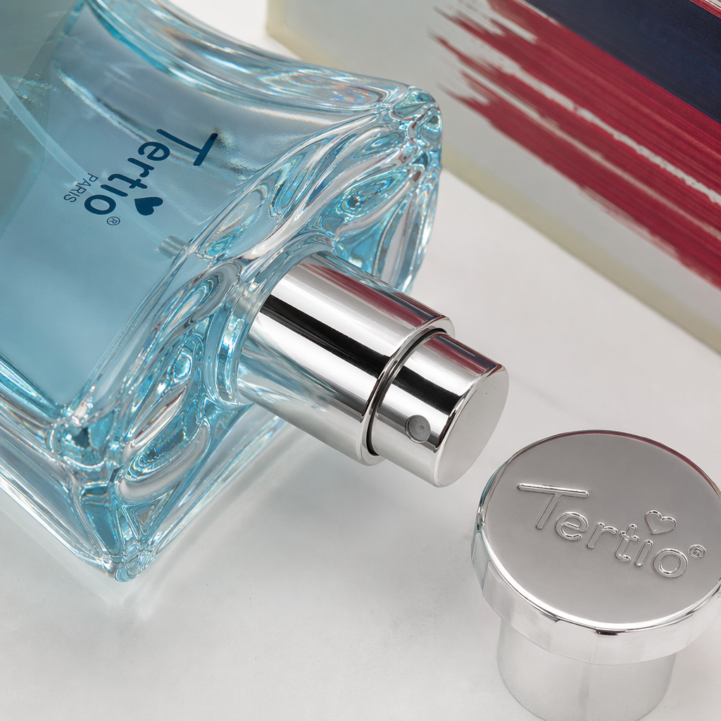 A transparent blue perfume bottle with a golden packaging box Application Scenario