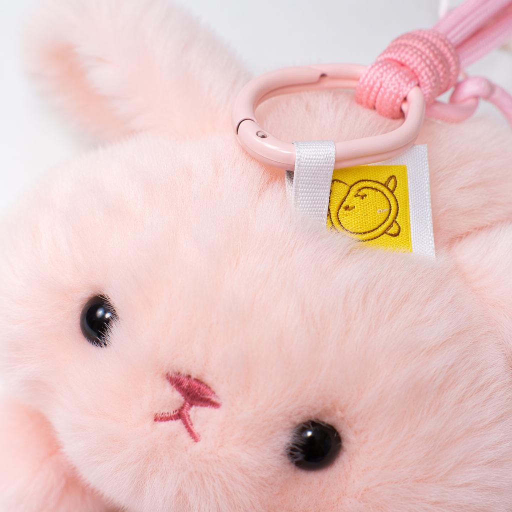 Pink plush rabbit pendant, cute and fun car bag keychain decoration Application Scenario