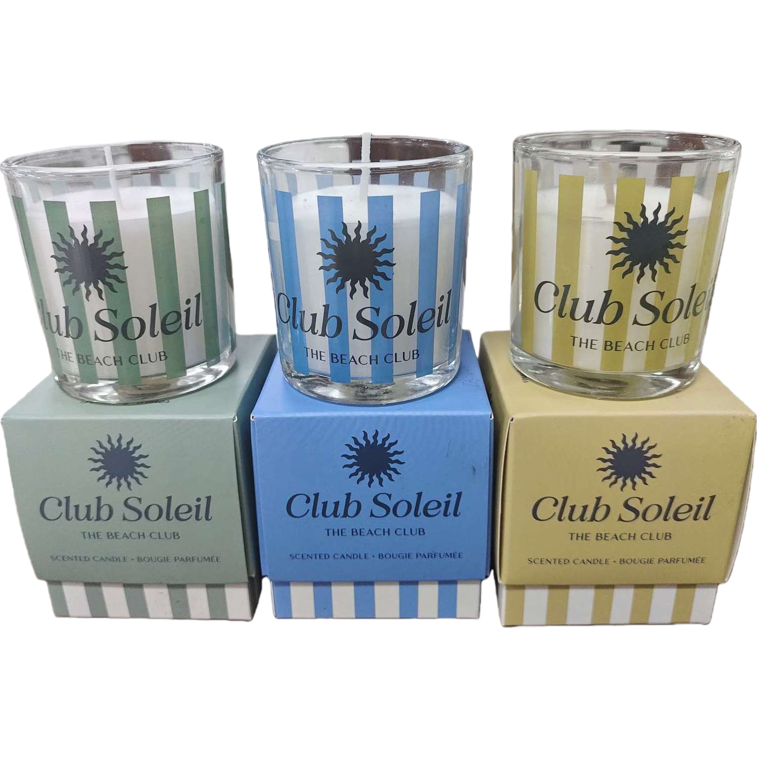 Club Soleil Three striped glass cup scented candles with green, white, blue, white, yellow and white sun patterns Item Picture